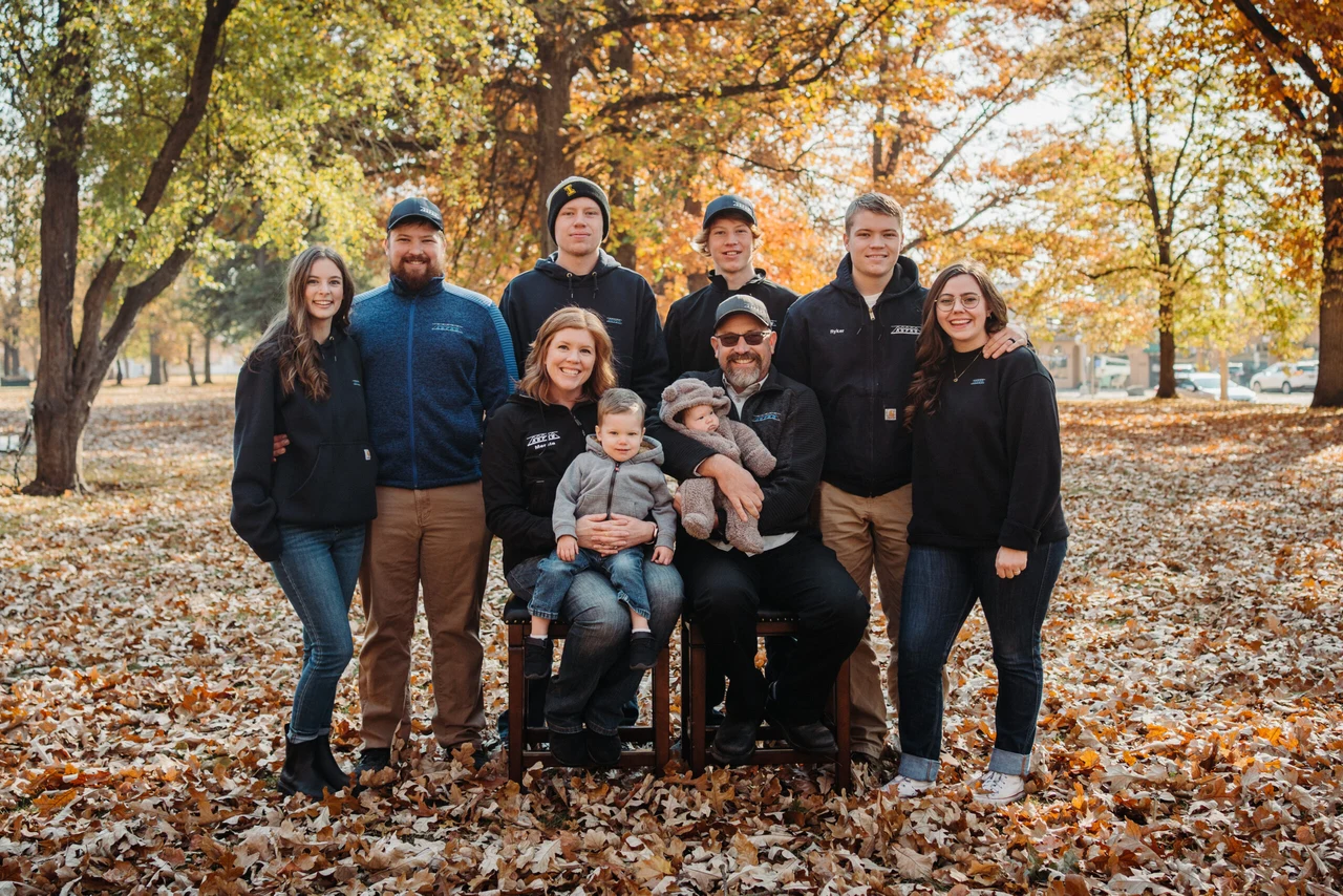 Blake and Mercia Neace with their family outdoors in autumn